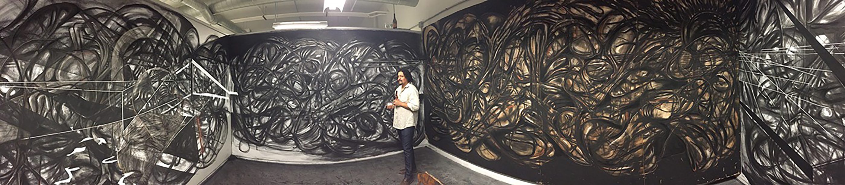 i let my ocean flow into you: a panorama of a room drawn in charcoal on every wall, a visitor standing inside it